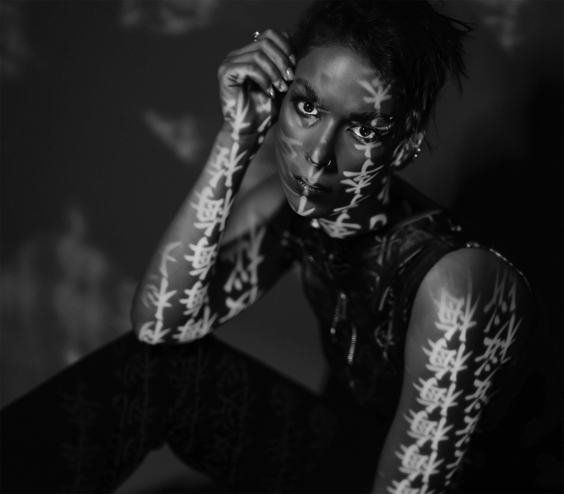 Artistic portrait with projected graphic patterns
